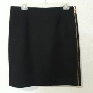Vince camuto • Black short skirt with gold zipper.